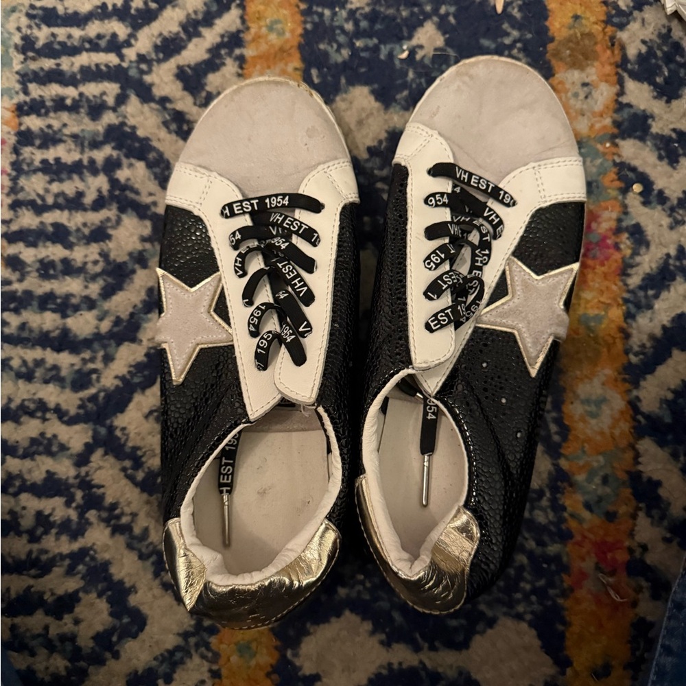 Black and White Star Sneakers with Gold Accents